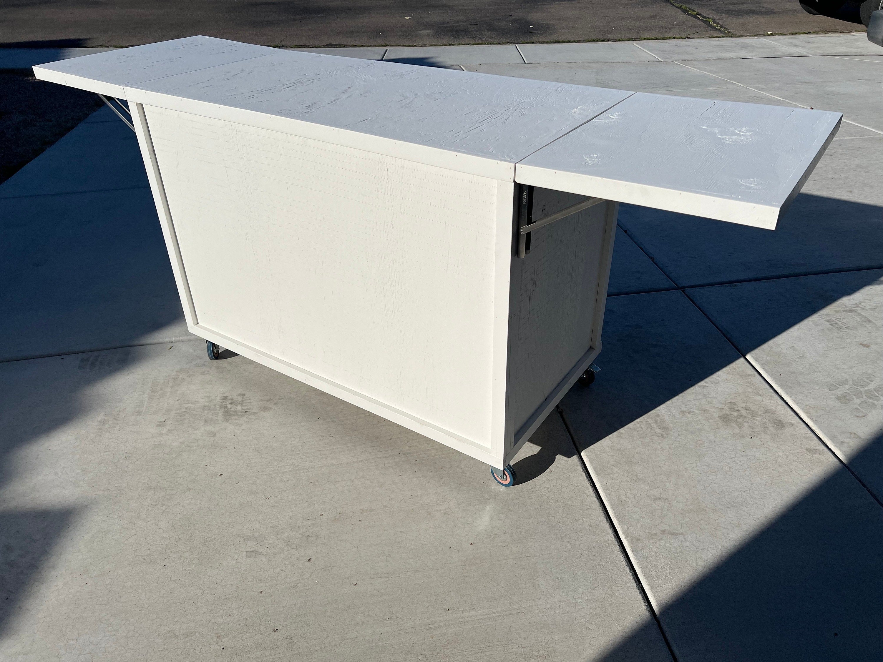 Wheeled Wonder: Portable Bar for Delicious Treats On-the-Go!
